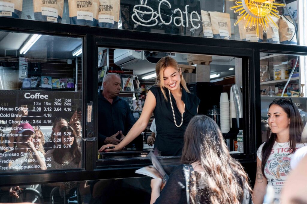 Addison Rae greeting fans during her W Magazine cover signing at Iconic Magazines, Mulberry Street