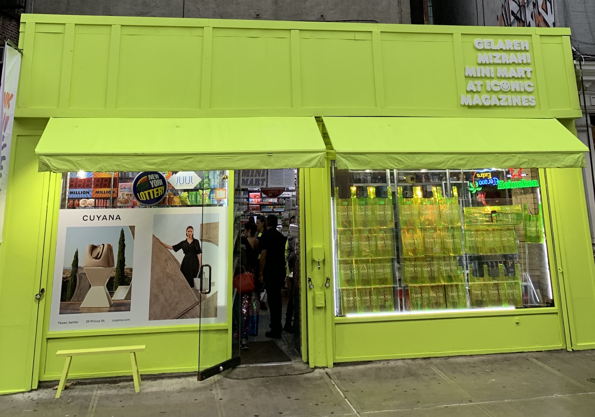 Iconic Magazines Lafayette storefront in neon green