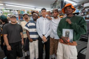 yeat event at iconic magazines with six men posing