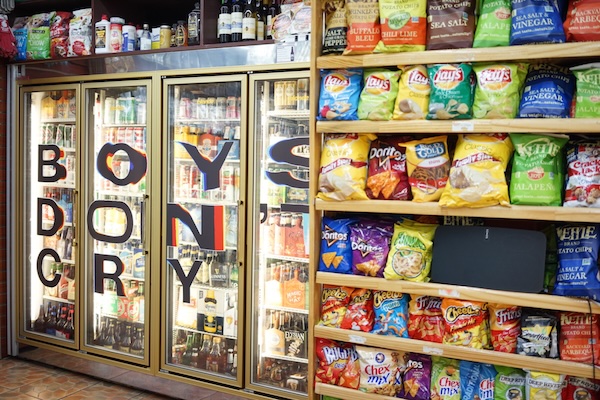 Boys Don’t Cry lettering across the refrigerators during Frank Ocean’s surprise New York pop-up.
